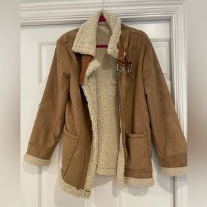 Women’s faux shearling very soft jacket with buckles. Brand new. Size XL.